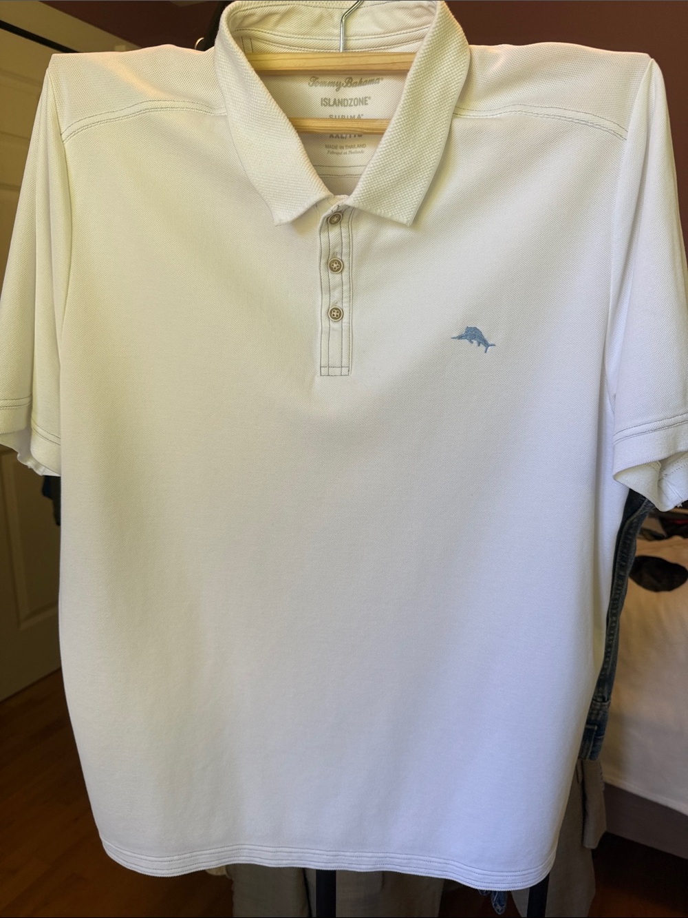 Tommy Bahama White Polo with Light Blue Dolphin Logo